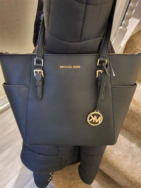 michael kors co to za firma|Michael Kors bag vinted.